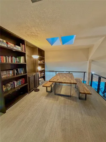 2nd story loft area, built-in bookcases