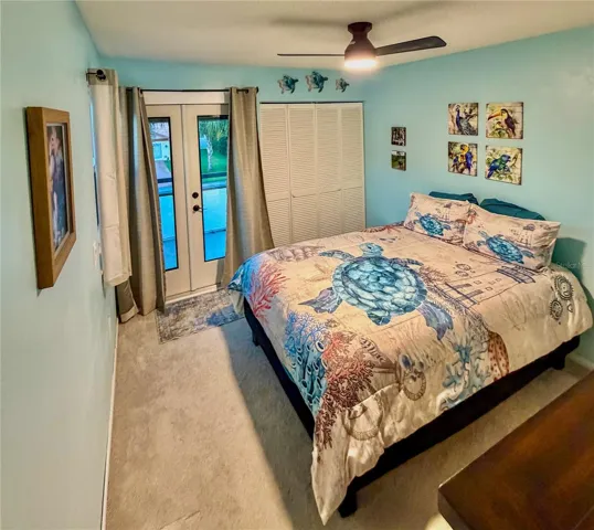 4th bedroom on 2nd floor with french doors to balcony