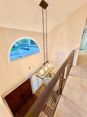 Bridge walkover across 2nd floor, beautiful entry chandelier