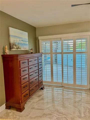 Master bedroom sliding doors going to the courtyard