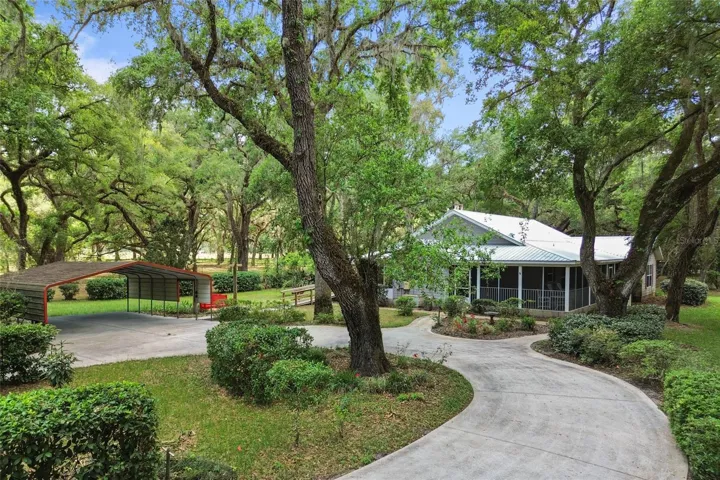 circular driveway at side of hom & carport