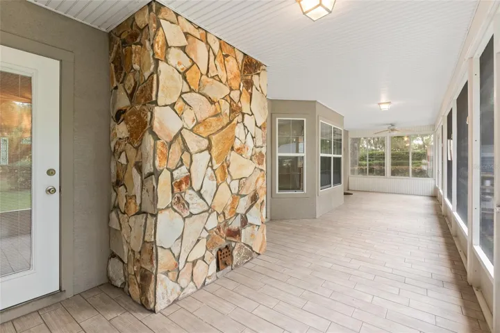 back screened porch includes 2 entry doors to inside of home