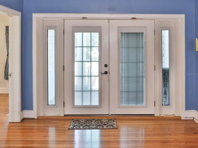 Foyer/Living Room. Original hardwood floors.