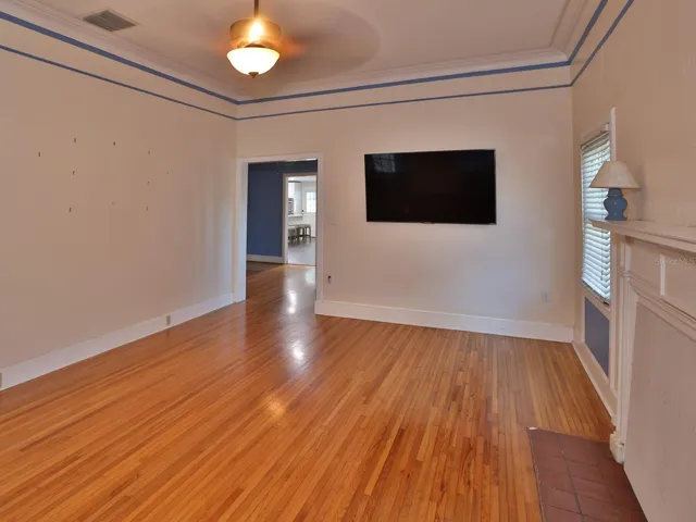 Family room with view of livingroom and kitchen.