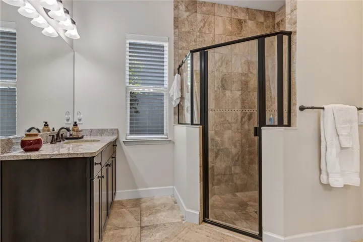 Master bathroom shower and 2nd vanity.