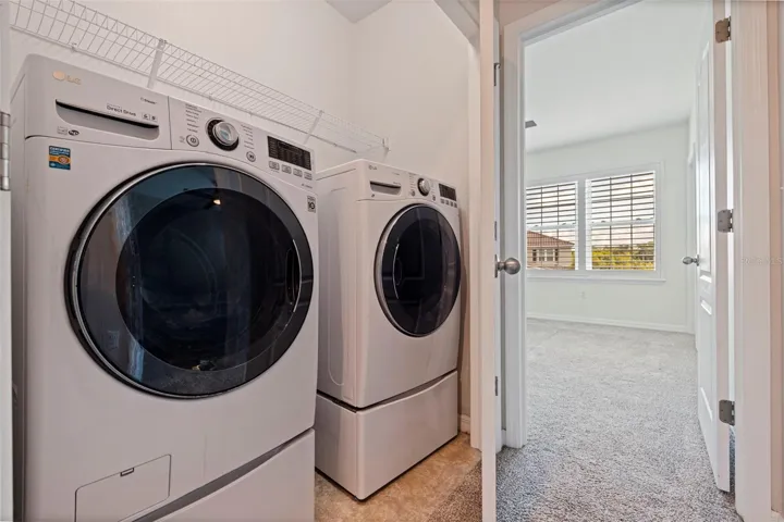 Upstairs laundry with LG front load washer/dryer