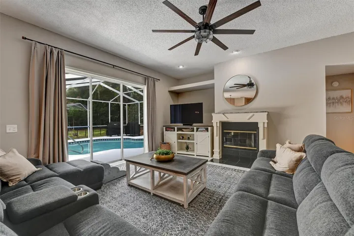 Family room with pocket slider access to the pool