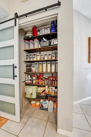 Pantry with barn door
