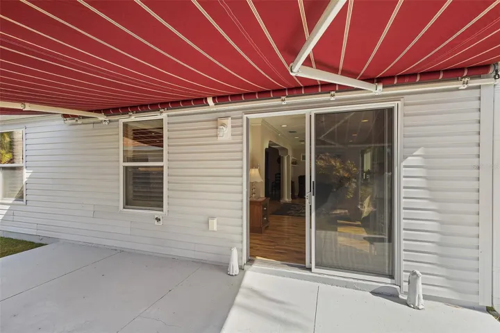 open side patio with retractable awning