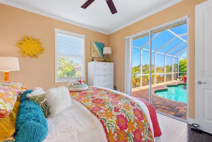 Guest Bedroom view of pool and Lanai