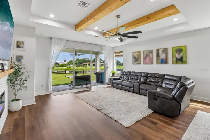 Great open floor plan with wood beams