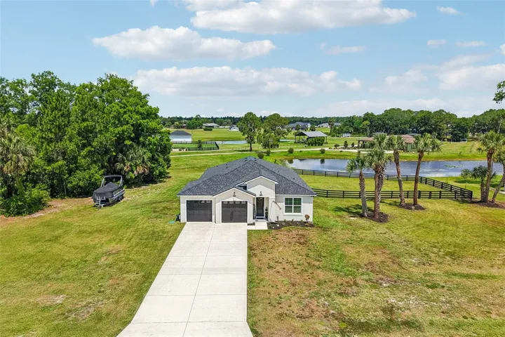 Beautiful 2023 home set on 1.38 acres. Chain of Lakes access - bring your boat, bring your RV.