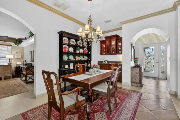 Dining with built in cabinets and serving station