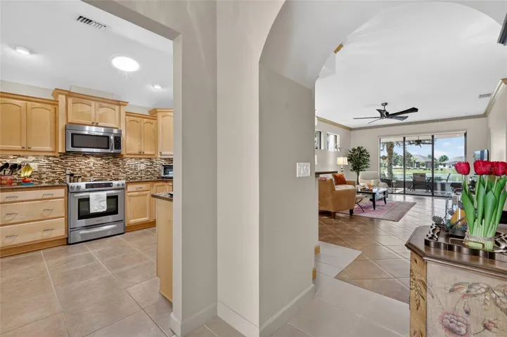 Foyer into kitchen; living room