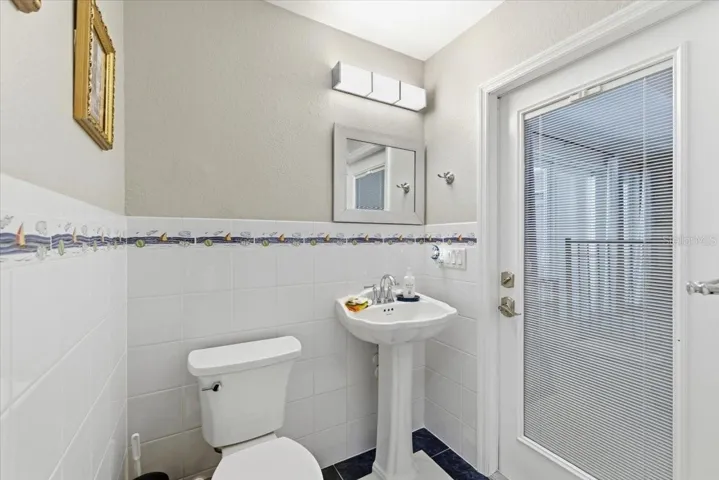 1/2 Bath off Sunroom/pool
