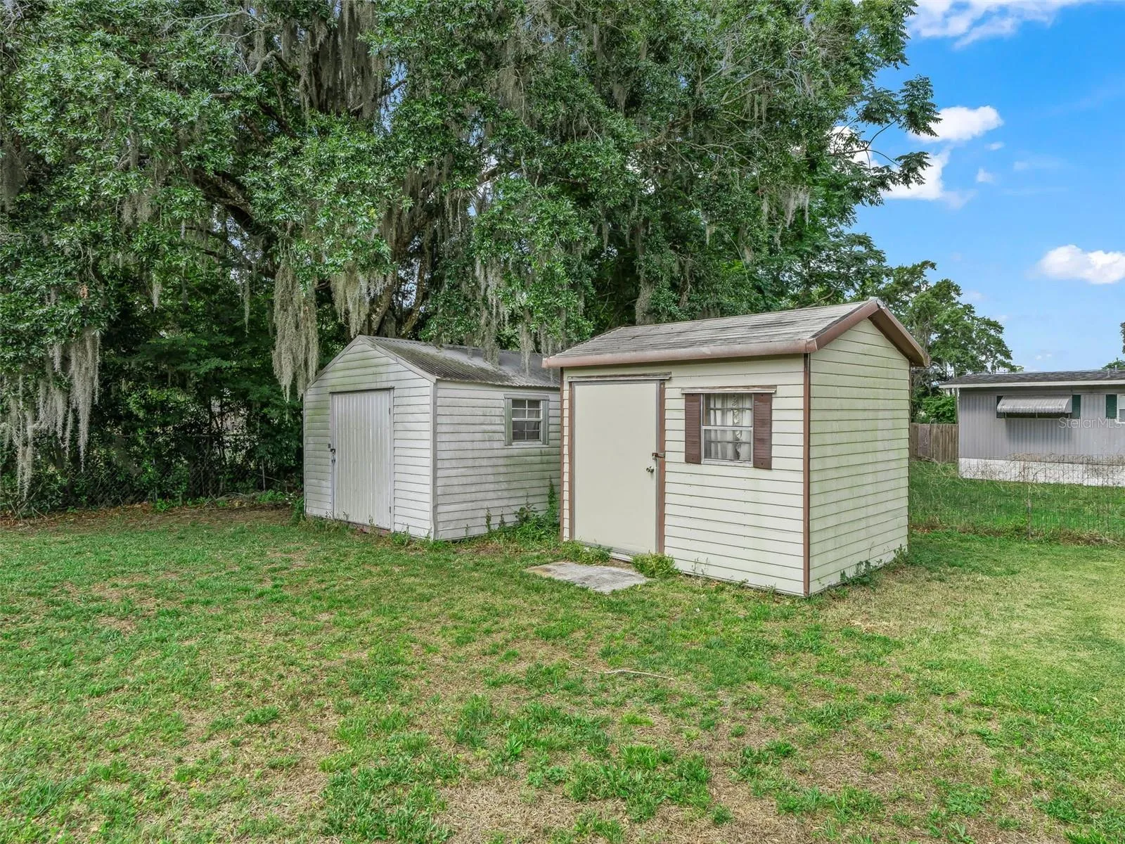 Two sheds in backyard