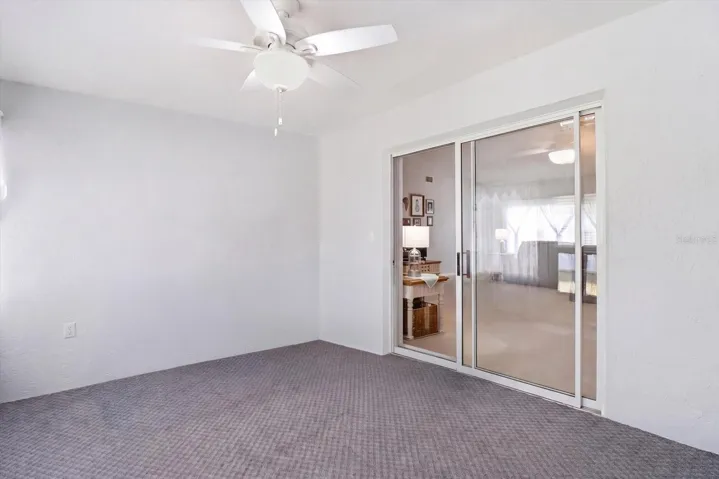 Enclosed Sunroom w/ Slider to the Living Room