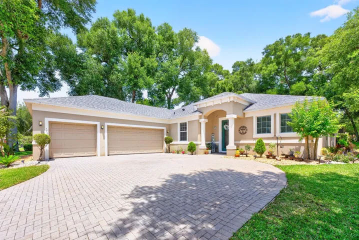 Perfectly positioned on a spacious .34 ACRE ~ CORNER LOT with mature trees and elevated land, this single-story 4-bedroom, 3-bath floor plan delivers the ideal combination of versatile space, functionality, and OUTDOOR LIVING with a highly desirable layout designed for everyday living and entertaining alike!