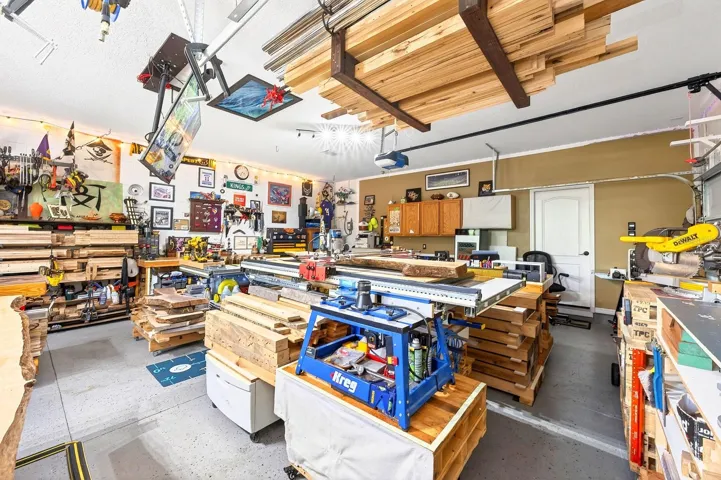 Garage has epoxy flooring, has been sealed and painted and is under air!