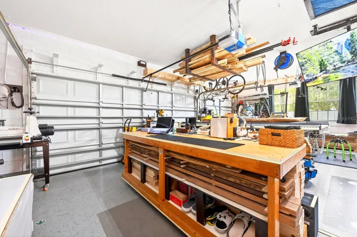 Garage has epoxy flooring, has been sealed and painted and is under air!
