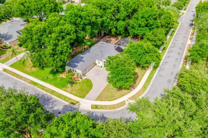 Oversized .34 acre corner lot full of gorgeous mature trees!