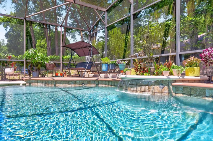 Private pool is complete with a waterfall feature.