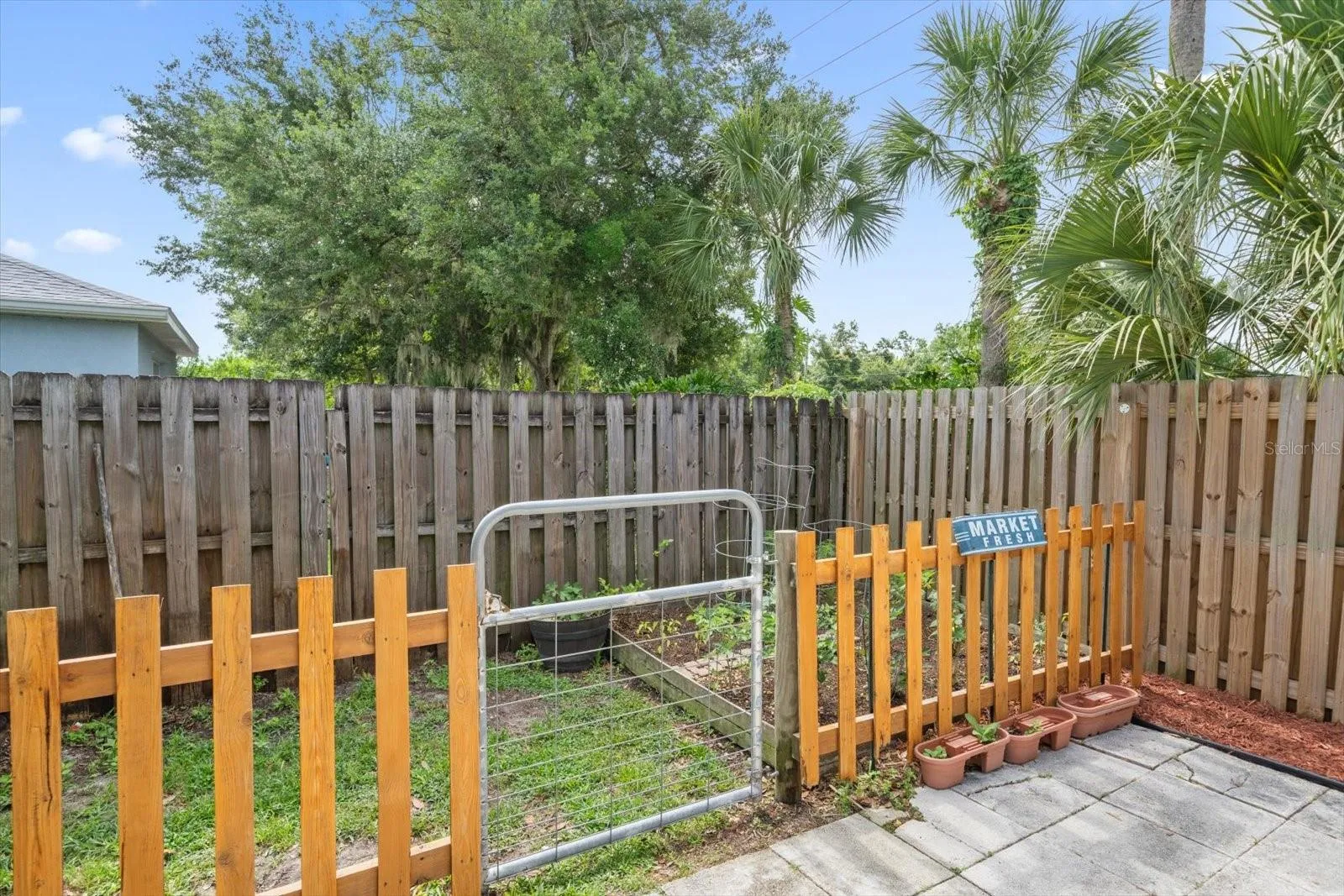Separate fenced garden area in backyard