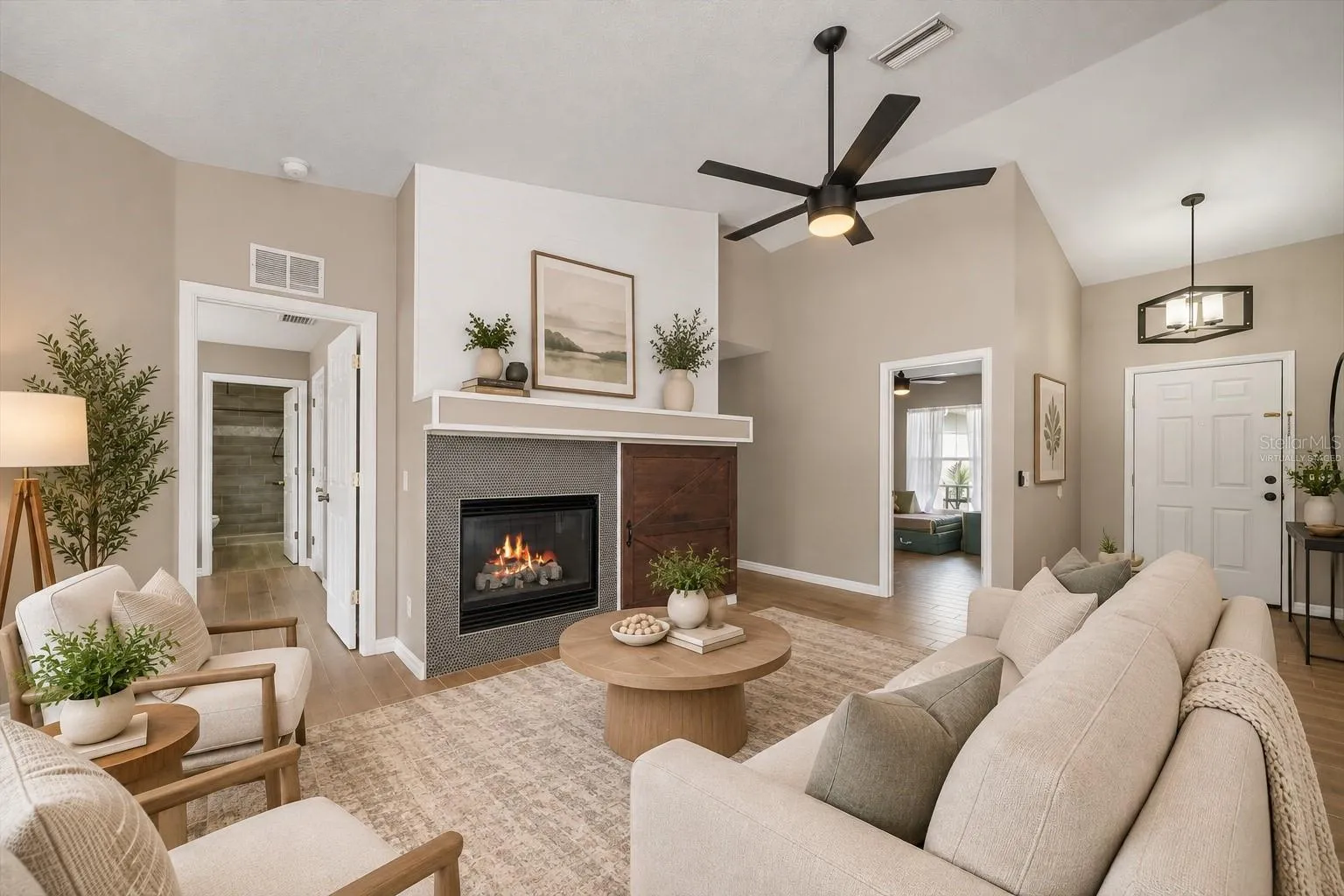 Virtually staged living room with gas fireplace