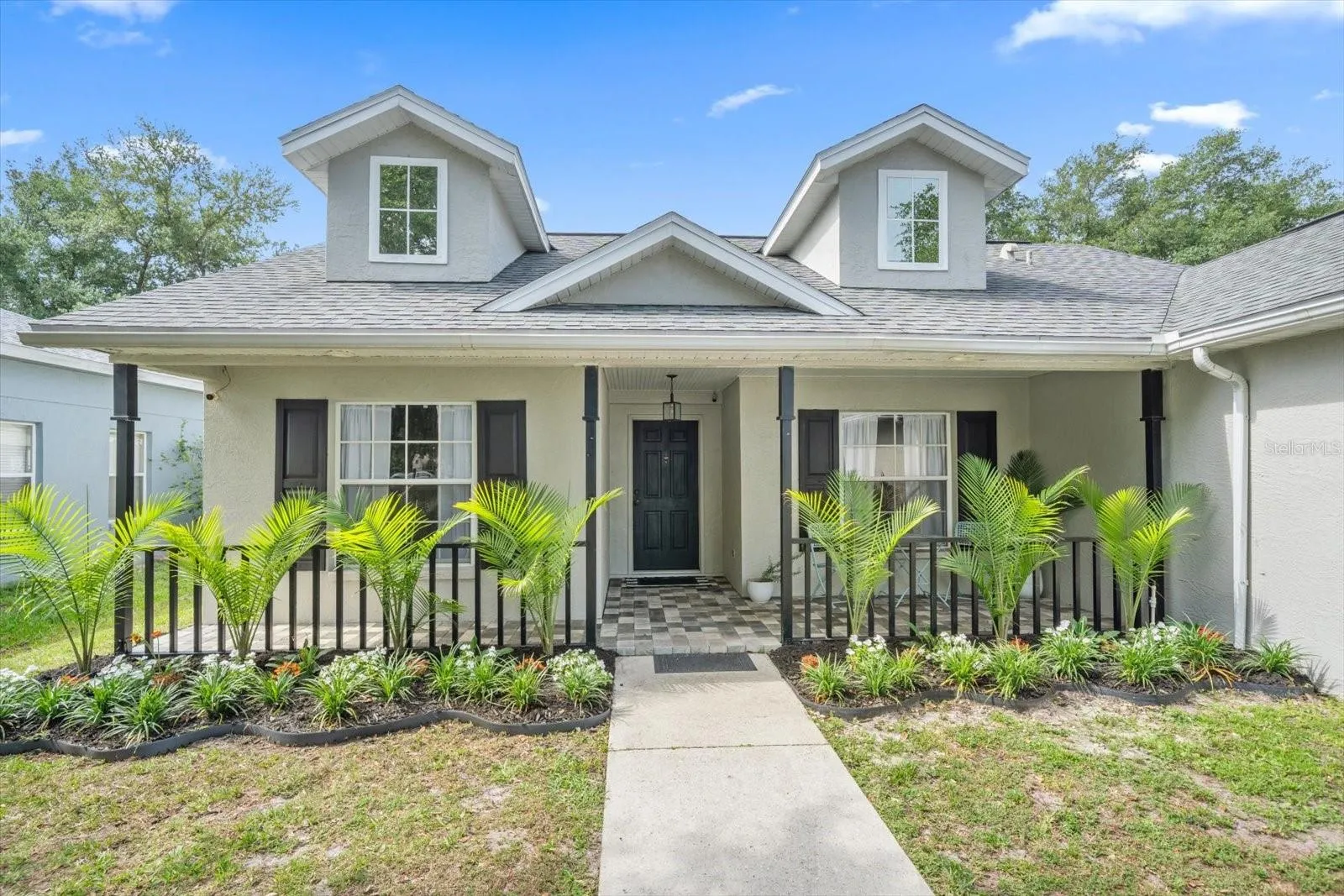 Front exterior of house with new landscaping