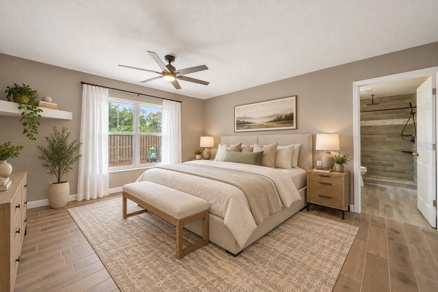 Virtually staged primary bedroom - with walk-in closet &amp; ensuite bathroom