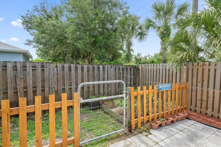Separate fenced garden area in backyard