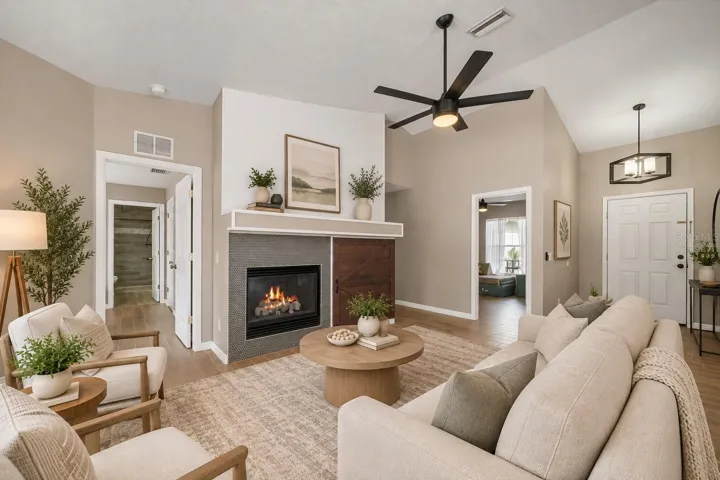 Virtually staged living room with gas fireplace