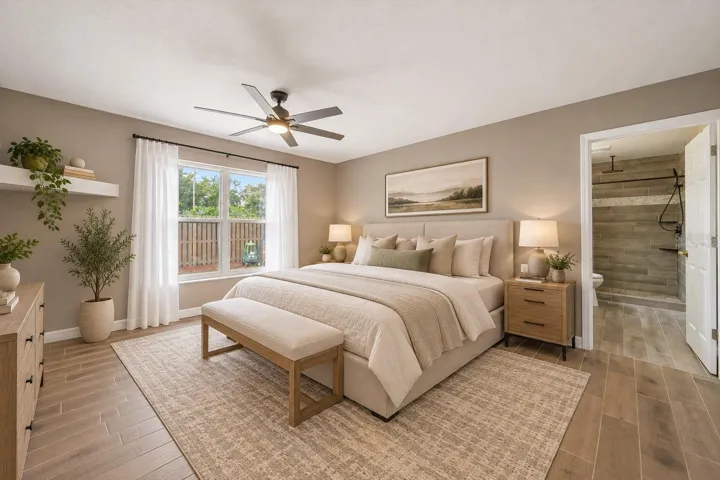 Virtually staged primary bedroom - with walk-in closet &amp; ensuite bathroom