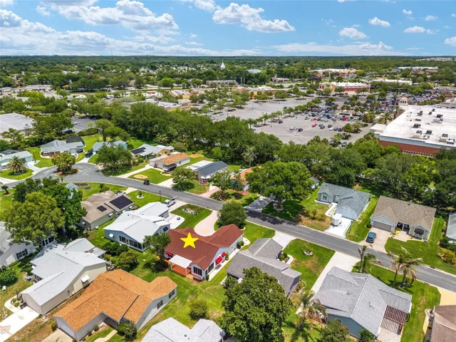 AERIAL looking northeast toward favorite nearby destinations, including Fiesta Bowl, Chick-fil-A, Staples, Home Depot, Michael’s, and more — all remarkably close to the home.
