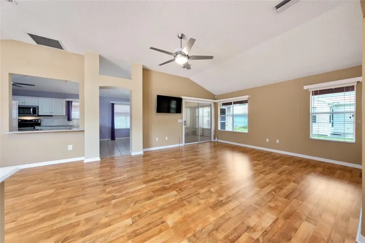 DINING AREA (L) and LIVING ROOM (R)