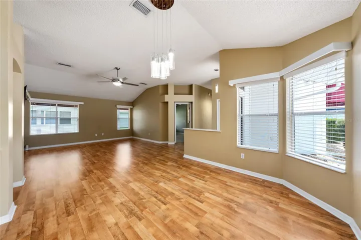 View looking back through DINING ROOM to the LIVING ROOM