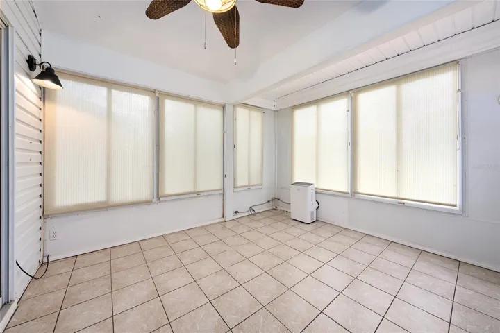 ENCLOSED LANAI with PLEXIGLASS windows