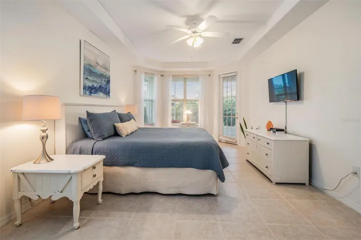 Master bedroom with high ceiling