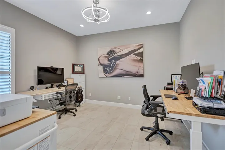 Office off foyer with barn door