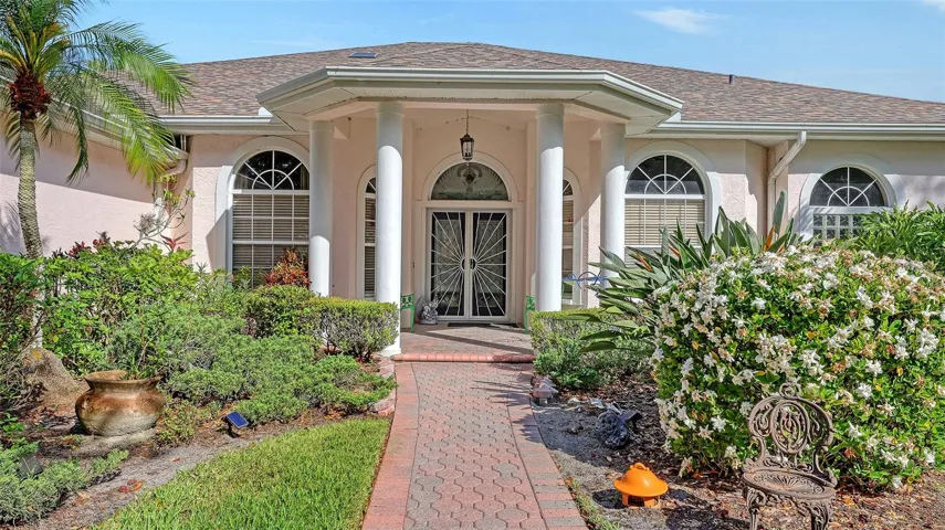 Paver Driveway & Sidewalk add to the elegance of this Custom Home