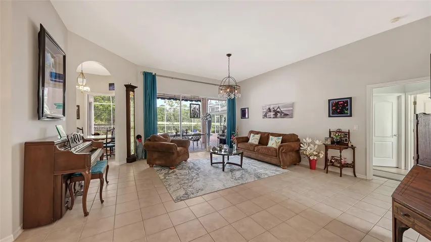 Huge Family Room overlooks the oversized pool