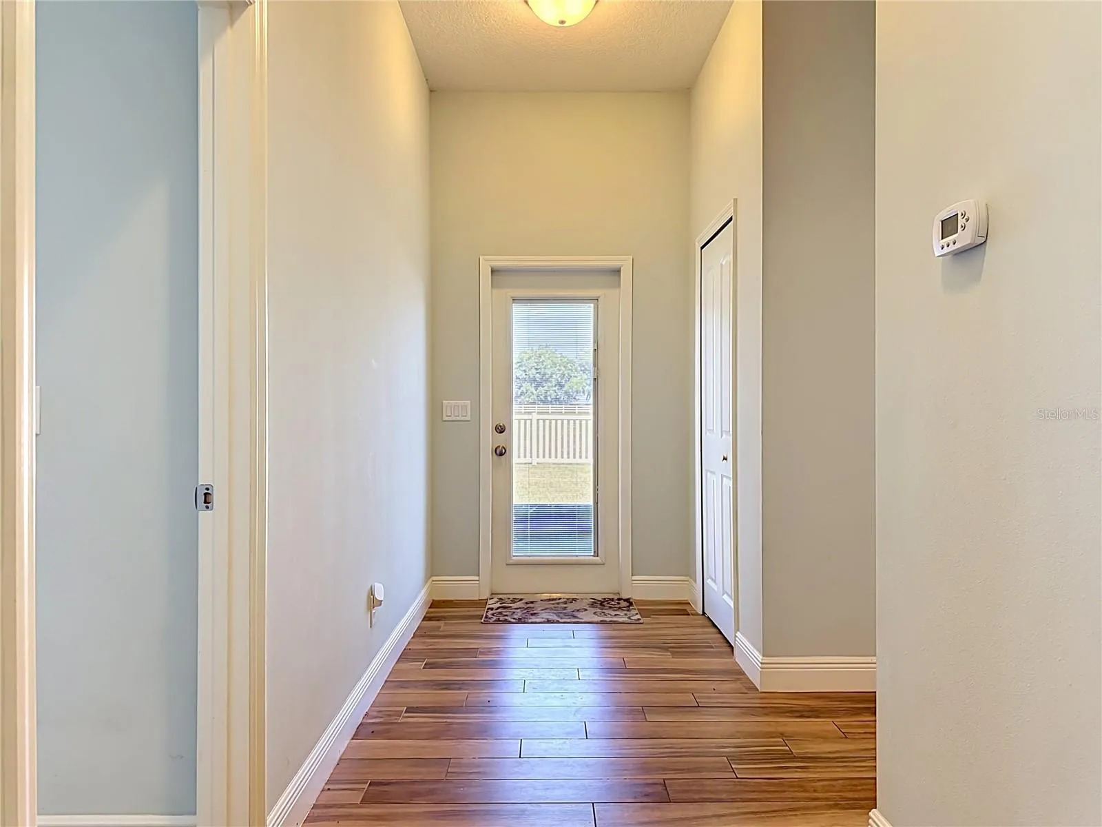 Hallway with storage to the guest wing