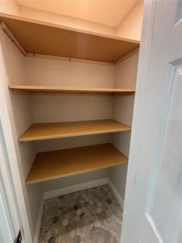 linen closet in main bathroom