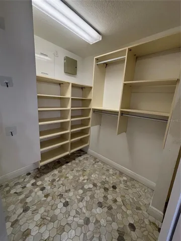 main bedroom walk in closet
