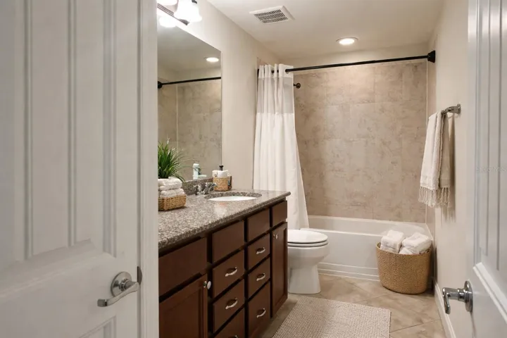 Upstairs Full Bathroom with Tub and Shower Combination