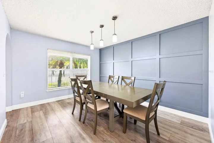 Formal dining with direct access to the kitchen, and a great place to start your tour!