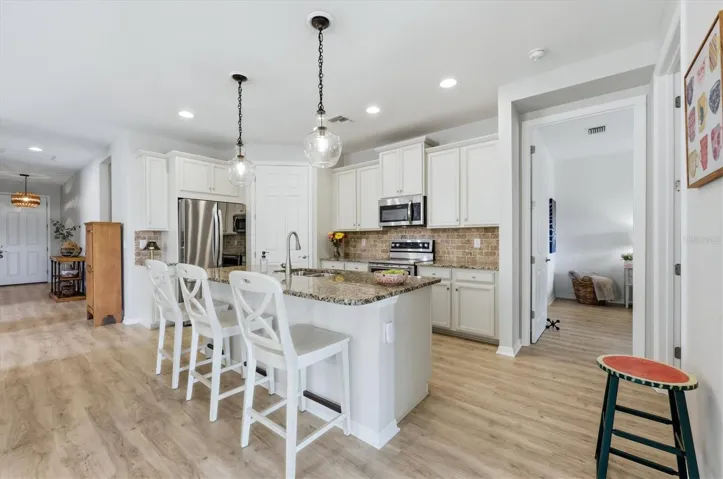 Kitchen with seating at the bar