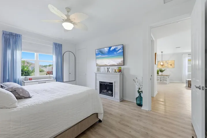 Primary bedroom with 2 walk-in closets