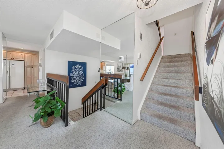 Stairs from main to mid levels