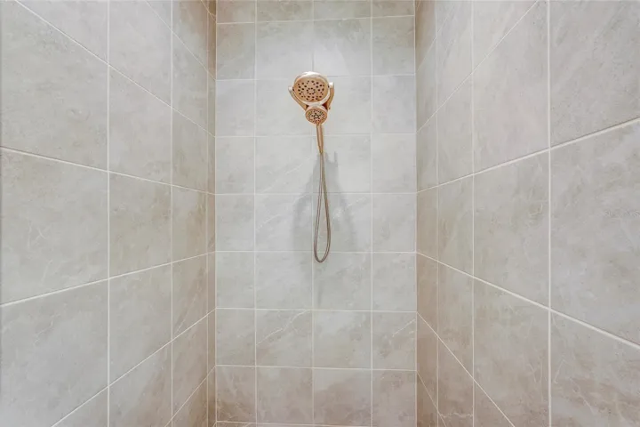Full Tiled Walk-in Shower w/ updated Shower Head